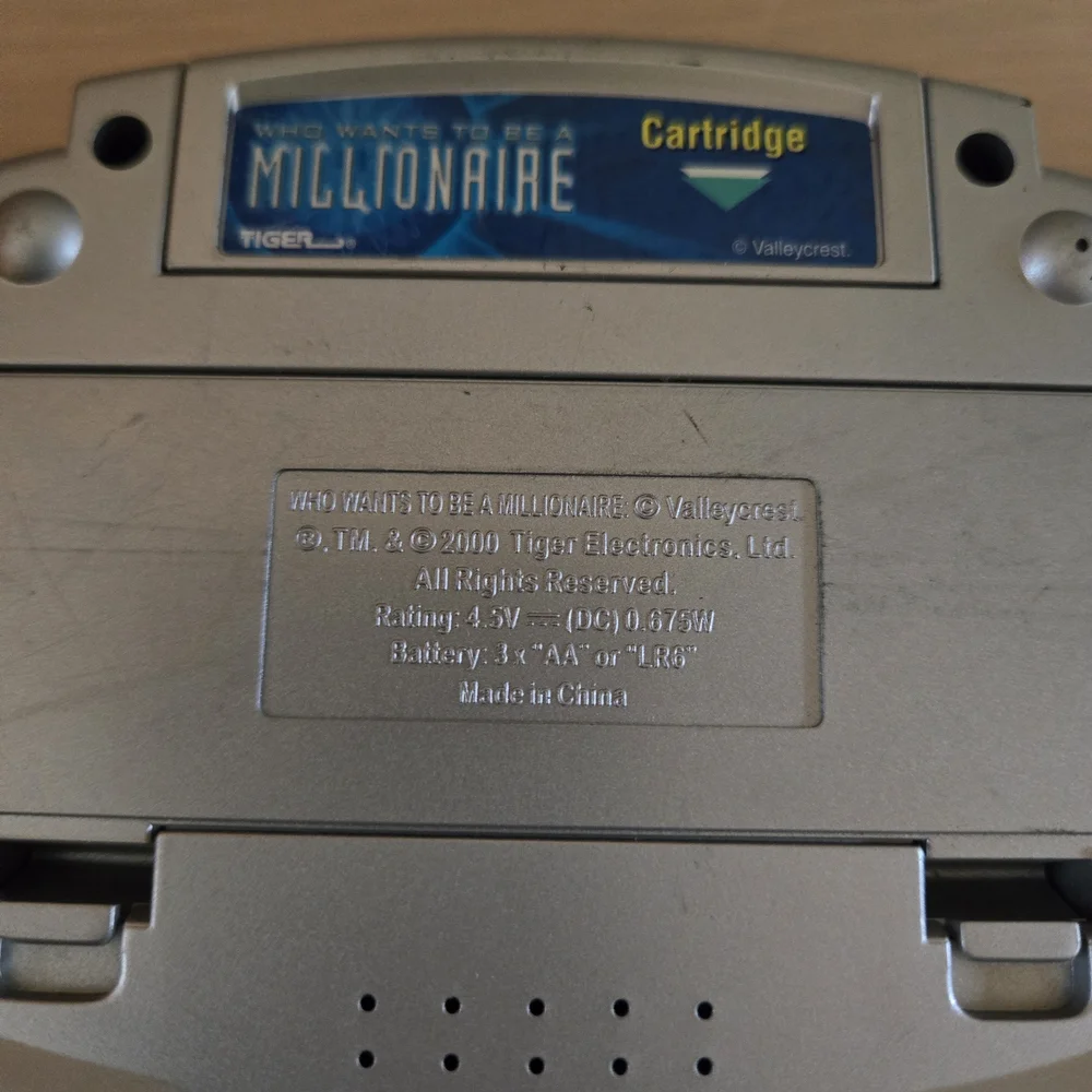 Vtg Who Wants To Be A Millionaire Handheld Electronic LCD Tiger Game Tested Work